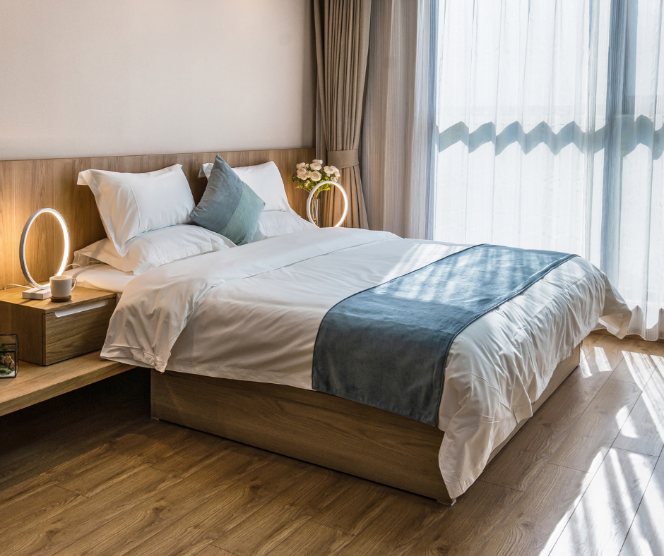 a comfortable, vacuumed bedroom that has been cleaned by experts with years of experience.